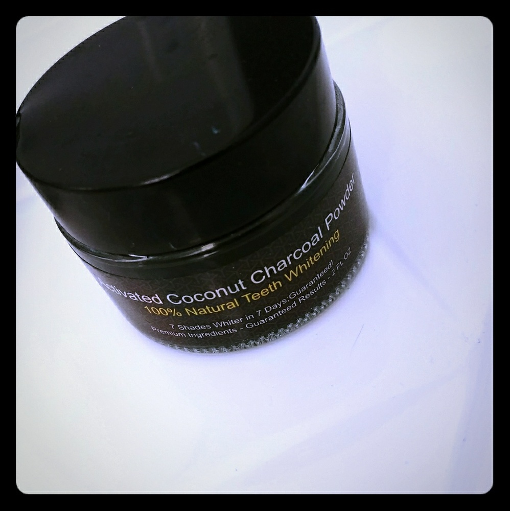 Charcoal powder teeth whitener
